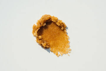 Texture, smear with crystals of organic sugar scrub for skin