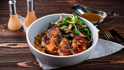 Fried pork fillet with mushroom salad, green beans, red onion, herbs and sauce.