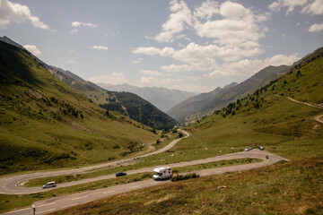 Obraz na płótnie Canvas road in mountains with camper