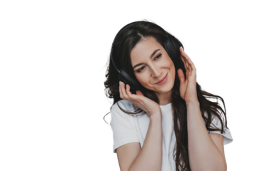 Close up of excited brunette woman with happy toothy smile in headphones listening music enjoying a new day, happy leisure time during vacations against transparent background. Pretty student