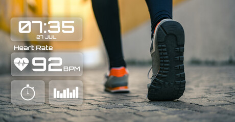 Man running in the park. Runner check heartbeat, steps and distance. Technology, health concept.