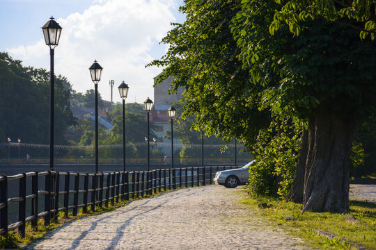 embankment of the old town with lanterns. outdoor scenery of downtown in morning light