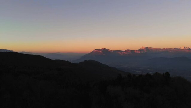 Drone shot of a sunset above Chambéry, Alpine mountain, la croix du Nivolet. Aerial view 
