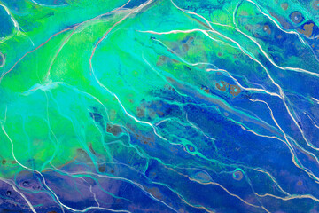 Blue abstract painting background, creative texture. Liquid, fluid art pattern. Original simulation of depth ocean and the sea surface. Modern design by alcohol ink. Tender multicolor artwork.