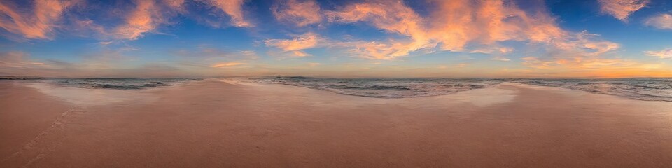 Fototapeta premium Sandy deserted beach with ocean waves on the shore. Skies and water meet on the horizon by generative AI