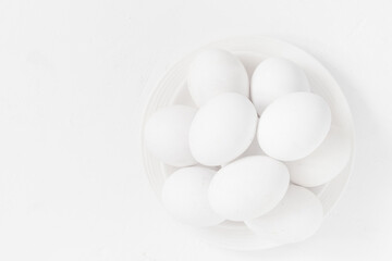 Easter background White eggs bowl