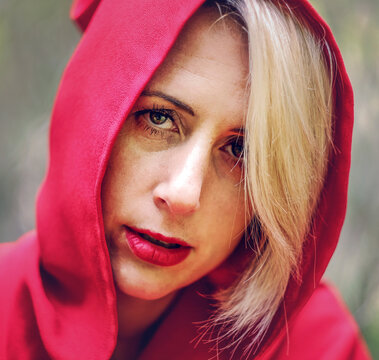 Red Riding Hood pretend in the forest
