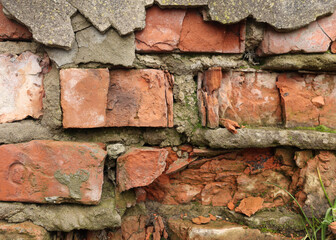 Brick wall. Red brick, old and ruined. Brickwork