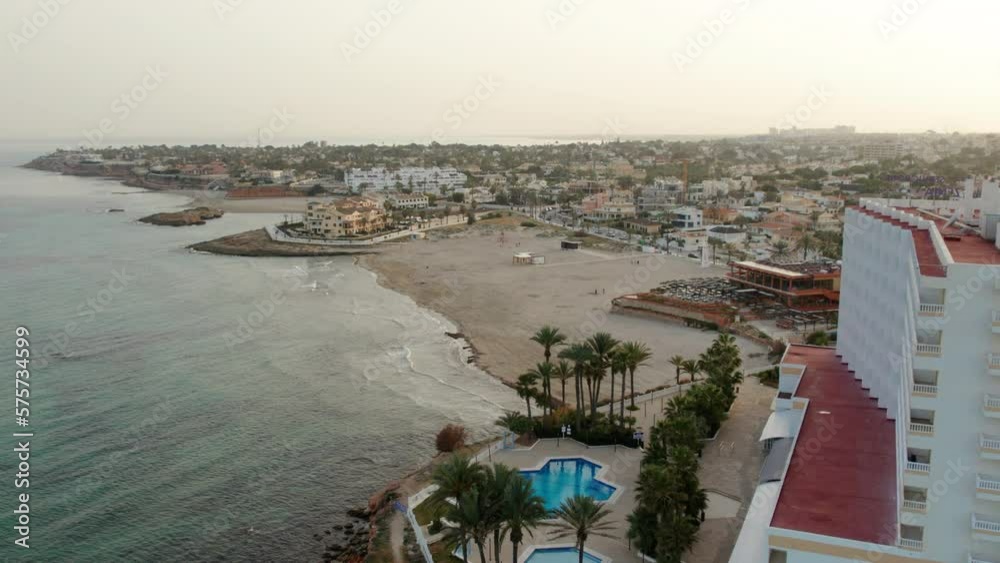 Poster Drone point of view La Zenia beach. Costa Blanca. Province of Alicante. Spain. Travel and tourism concept