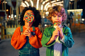 Kids having fun on a carnival Carousel