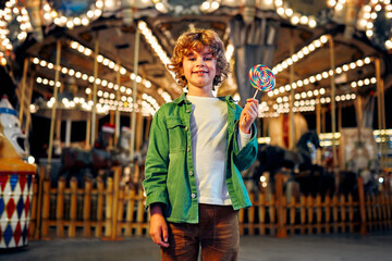 Kids having fun on a carnival Carousel