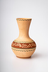 Clay jug isolated on white background