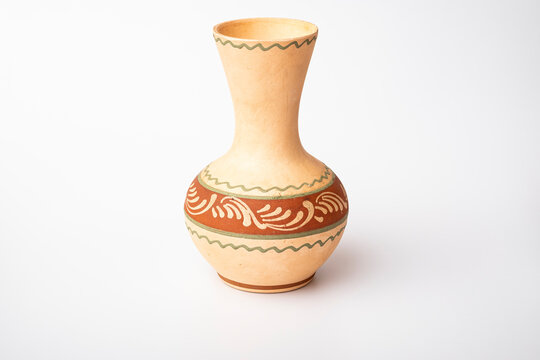 Clay jug isolated on white background