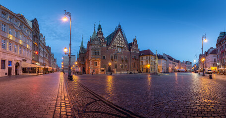 Panorama of the main square of Wroclaw with the old city hall and nearby buildings and street...