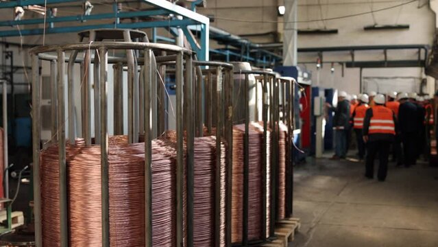 cable reels, welding wire, Copper wiring. Industrial facility produces copper wire and cable in reefs, factory produces copper wire cable in coils, steel manufacturing plant