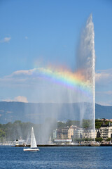 Switzerland, Geneva. A rainbow over the Jet d'Eau (Water-Jet) on Lake Geneva. August 16, 2022.