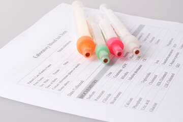 Laboratory form for biochemical analysis of blood with test tubes for blood collection