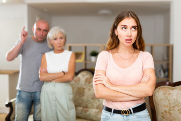 The Daughter-in-law is offended by her husband and mother-in-law. Domestic quarrel