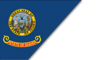 Flags of Idaho and copy space on fabric surface. White background and Idaho flag