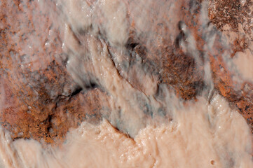 Abstract patterns in a desert runoff stream