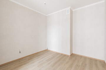 Empty gray room ready for people to move in