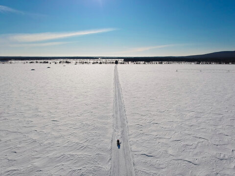 Aerial view of snowmobile trail - Powered by Adobe