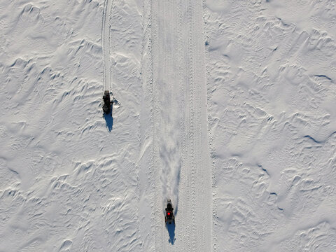 Aerial view of snowmobile trail - Powered by Adobe