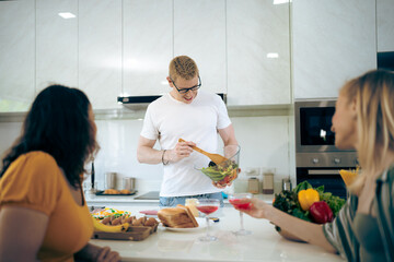 Happy family activity with food together, Portrait of smiling mother and children standing at cooking counter preparing ingredient for dinner meal, Lovely cute family making food at home kitchen