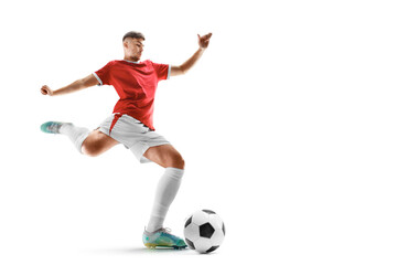 Professional soccer player hits the ball for the winning goal. Wide angle. Soccer. The concept of sport, competition, movement, overcoming © Ruslan Shevchenko