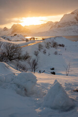 winter landscape near Brattholmen, ,Trandamperi and  Nusfjord Spa with midnight sun under dark...