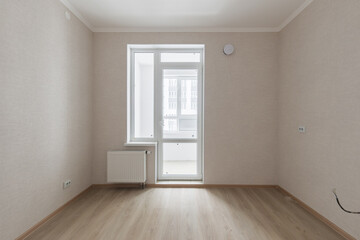 Empty gray room ready for people to move in