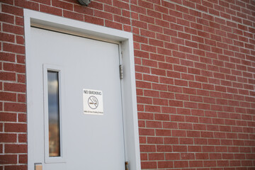 No smoking sign on wall showing to quit smoking and better for environment