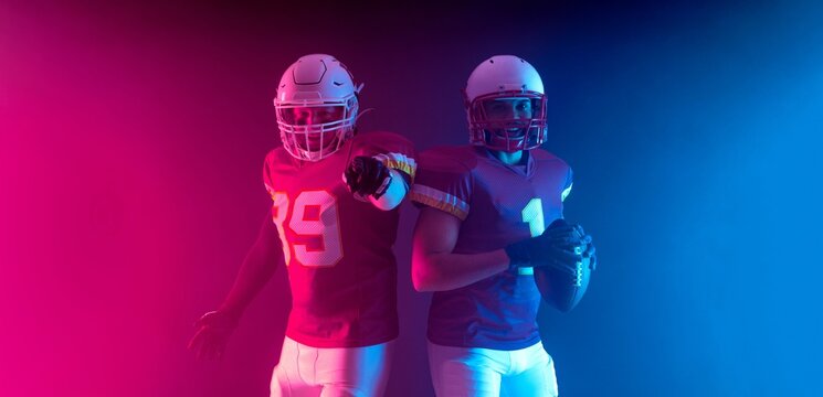Two American football players in neon lights. Template for bookmaker ads with copy space. Mockup for betting advertisement.