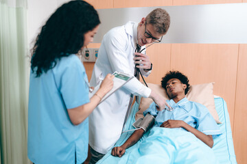 Professional doctor team using a stethoscope checking patient with examining in hospital, presenting results symptom and recommend treatment method, Healthcare and medical health insurance concept