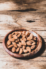 pile of natural almonds (Prunus dulcis) close-up image