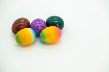 Easter multicolored eggs on a light background.Easter food.Spring religious holiday.Easter holiday...