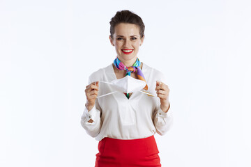smiling modern flight attendant woman on white