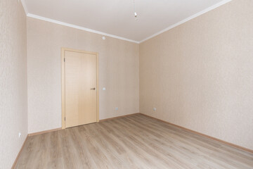 Empty gray room ready for people to move in