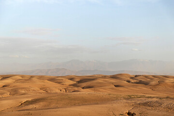 Fototapeta na wymiar Afternoon scene in remote Agafay Desert near Marrakesh Morocco