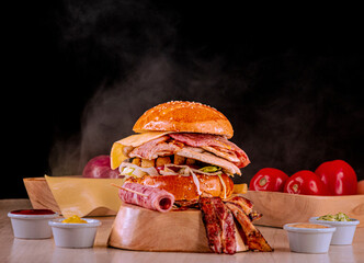 Scrumptious burger with chorizo, crispy bacon, and perfectly cooked fries
