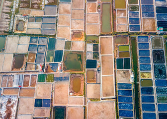 Fototapeta na wymiar Shrimp farms near the seaside in Vietnam viewed from a drone. 
