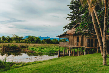 Traditional Malay house on lake