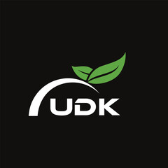 UDK letter nature logo design on black background. UDK creative initials letter leaf logo concept. UDK letter design.