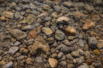 Rocky shapes on the beach. textures and patterns generated on the stones of the Ibiza.
