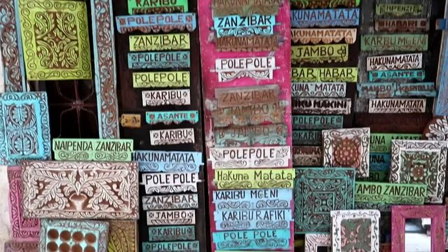 Handmade wooden panels with some Zanzibar typical words as a way of life and philosophy
