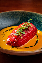 stuffed red pepper with sauce
