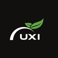 UXI letter nature logo design on black background. UXI creative initials letter leaf logo concept. UXI letter design.