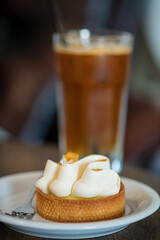iced coffee with pastry in cafe
