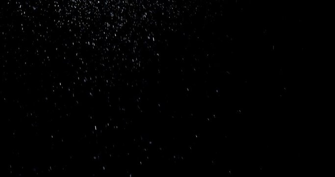 Dust background. Night snow. Galaxy stardust storm. Universe space. Silver shiny glitter particles floating on dark abstract overlay.