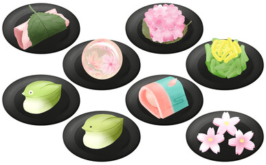 黒皿に乗った春の和菓子8種 白背景　桜餅・うぐいす・練りきり・菜の花